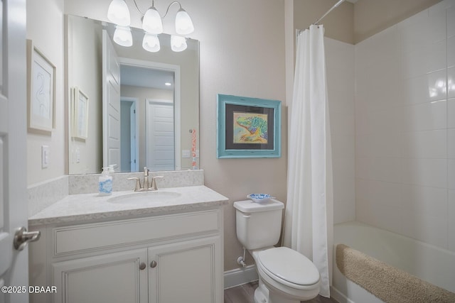3013 Kenmare St, Ormond Beach, FL 32174 - bathroom with vanity, toilet, and shower / tub combo with curtain