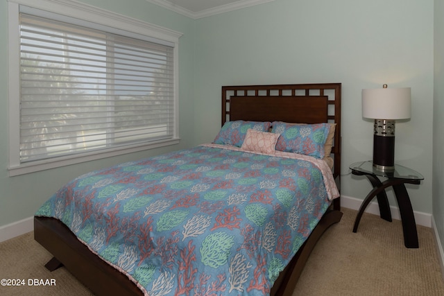 bedroom with carpet and ornamental molding