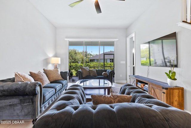 6423 Hanfield Ln, Port Orange, FL 32128 - living room featuring ceiling fan and baseboards