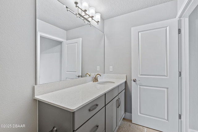 6423 Hanfield Ln, Port Orange, FL 32128 - bathroom featuring vanity and a textured ceiling