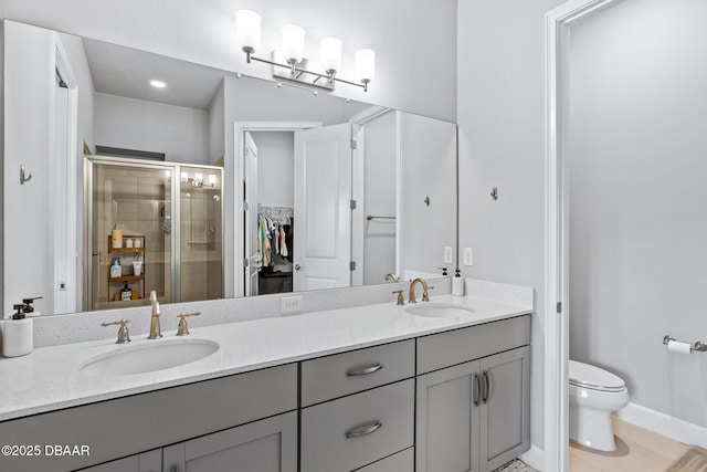 6423 Hanfield Ln, Port Orange, FL 32128 - full bath with double vanity, a stall shower, a spacious closet, and tile patterned flooring