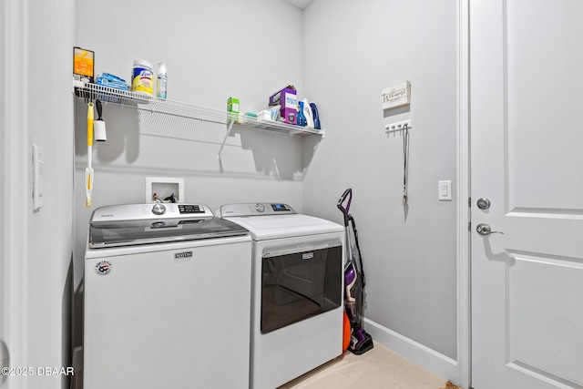 6423 Hanfield Ln, Port Orange, FL 32128 - washroom with washer and clothes dryer and tile patterned floors