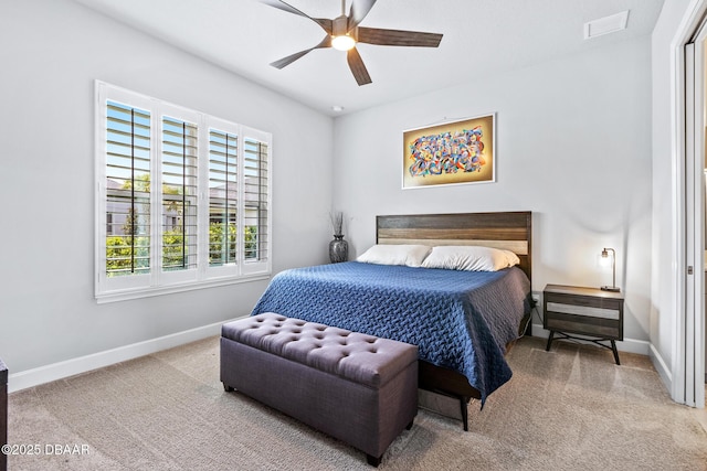 6423 Hanfield Ln, Port Orange, FL 32128 - carpeted bedroom with baseboards and a ceiling fan