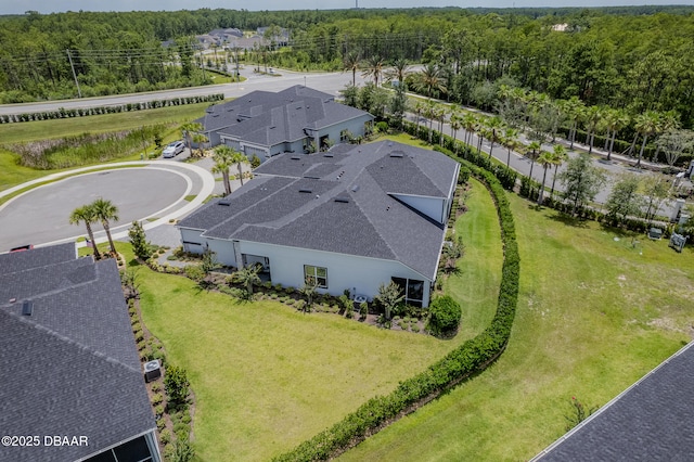 6423 Hanfield Ln, Port Orange, FL 32128 - view from above of property with a heavily wooded area