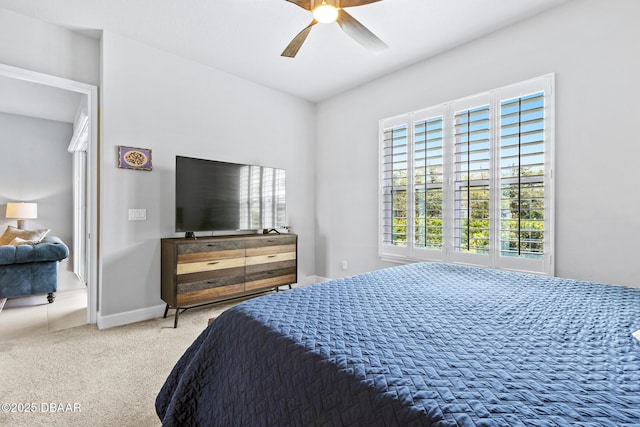 6423 Hanfield Ln, Port Orange, FL 32128 - carpeted bedroom with a ceiling fan and baseboards