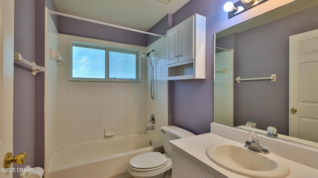 full bath featuring vanity, shower / tub combination, and toilet