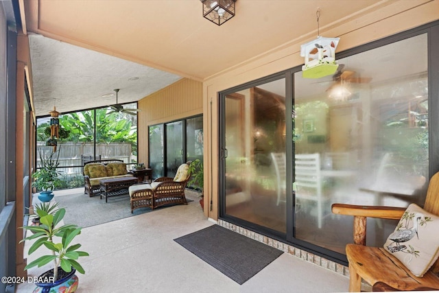 property entrance featuring ceiling fan and a patio area