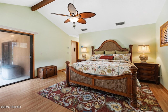 bedroom with vaulted ceiling with beams, wood-type flooring, and ceiling fan