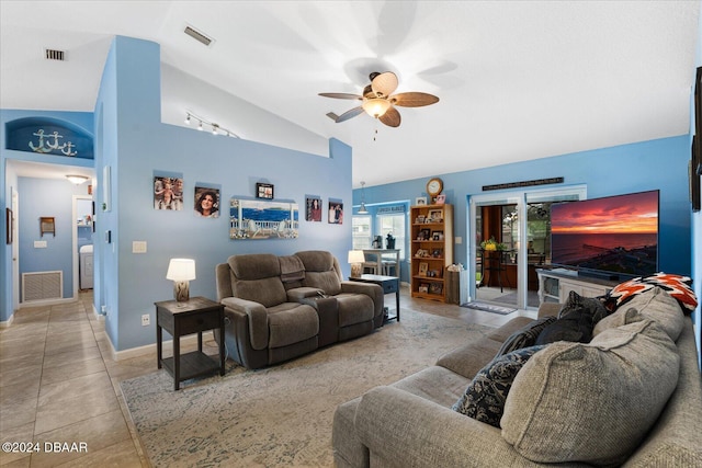 living room with high vaulted ceiling, light tile patterned floors, and ceiling fan