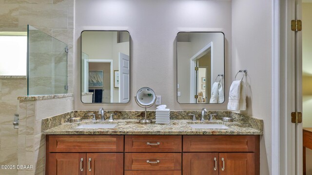 1453 Sunningdale Ln, Ormond Beach, FL 32174 - full bathroom with a sink, double vanity, and tiled shower