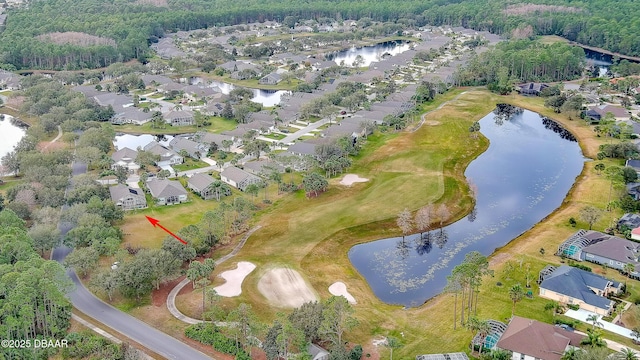 1453 Sunningdale Ln, Ormond Beach, FL 32174 - drone / aerial view with a wooded view, a water view, and a residential view