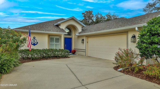 1453 Sunningdale Ln, Ormond Beach, FL 32174 - single story home featuring a garage, driveway, roof with shingles, and stucco siding