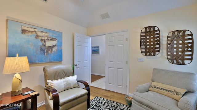 1453 Sunningdale Ln, Ormond Beach, FL 32174 - sitting room featuring visible vents, baseboards, and wood finished floors
