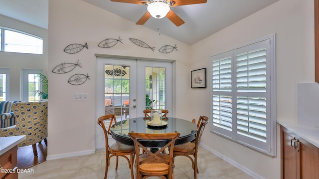 1453 Sunningdale Ln, Ormond Beach, FL 32174 - dining room featuring french doors, a ceiling fan, baseboards, and lofted ceiling