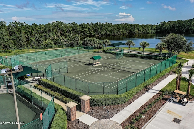 1453 Sunningdale Ln, Ormond Beach, FL 32174 - view of sport court featuring a water view, a view of trees, and fence