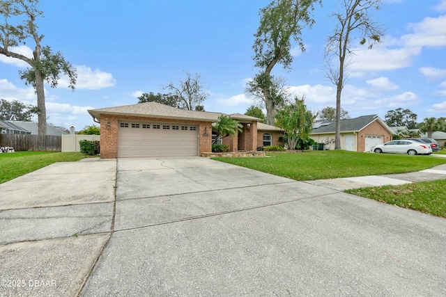 ranch-style home with a garage and a front lawn