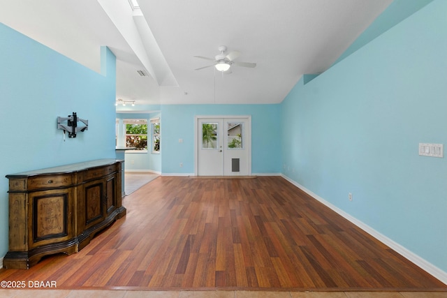 interior space featuring hardwood / wood-style flooring and ceiling fan