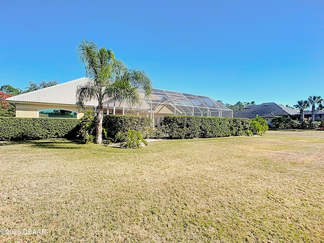 view of yard featuring a lanai