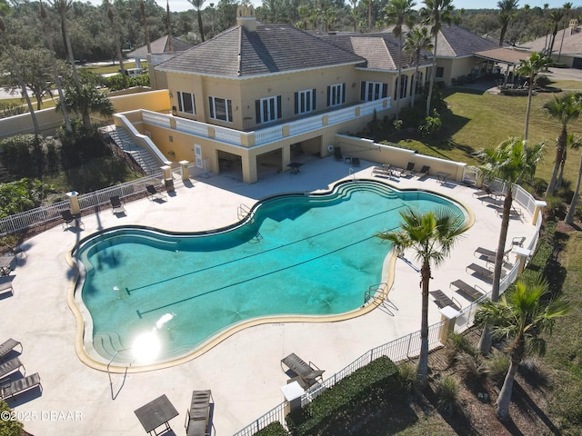 view of pool featuring a patio