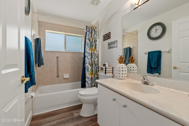 full bathroom featuring shower / bath combo, toilet, vanity, and hardwood / wood-style flooring