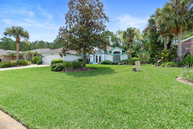 view of yard featuring a garage