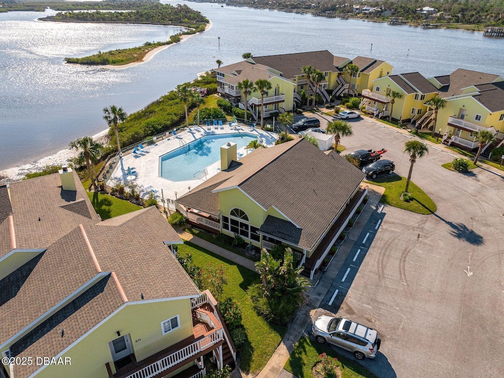 aerial view with a residential view and a water view