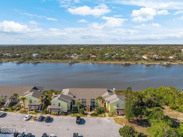 aerial view with a water view and a residential view