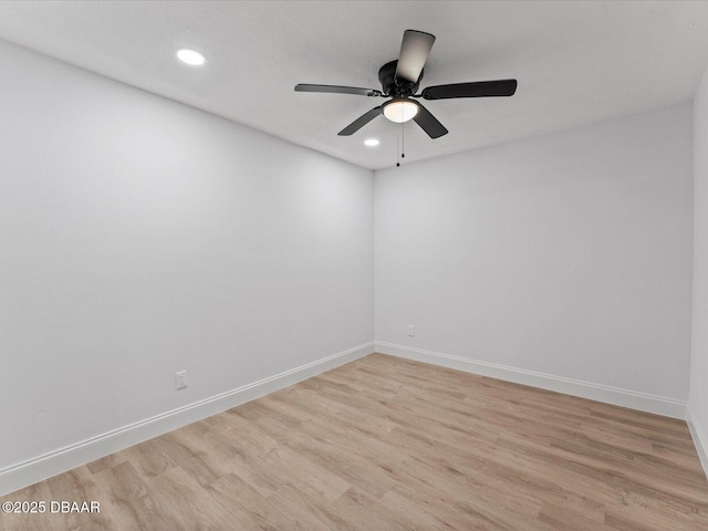 unfurnished room with light wood-style floors, recessed lighting, baseboards, and a ceiling fan