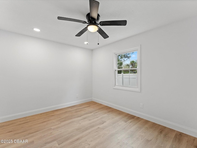 unfurnished room featuring baseboards, recessed lighting, a ceiling fan, and light wood-type flooring
