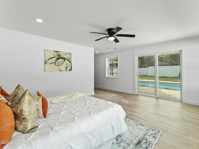 bedroom with access to outside, ceiling fan, recessed lighting, baseboards, and wood finished floors