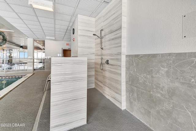 2937 S Atlantic Ave Unit 1108, Daytona Beach Shores, FL 32118 - full bath with tile walls and a tile shower