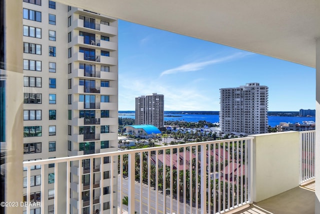 balcony featuring a water view