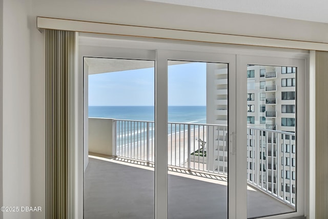 2937 S Atlantic Ave Unit 1108, Daytona Beach Shores, FL 32118 - doorway to outside featuring view of water and beach