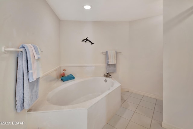 bathroom featuring a tub and tile patterned floors