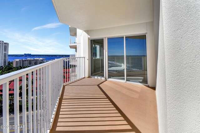 balcony featuring a water view