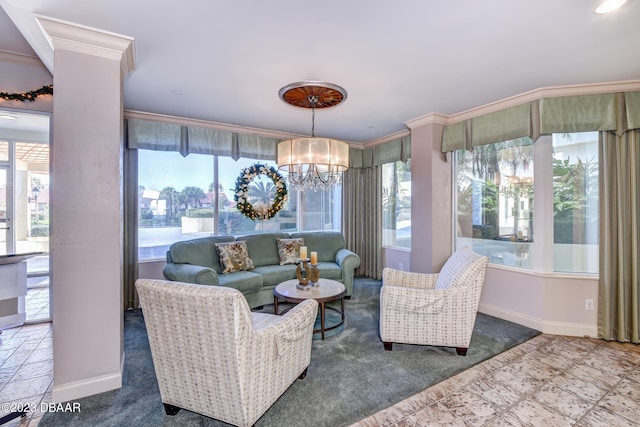 carpeted living room with a healthy amount of sunlight, an inviting chandelier, and crown molding