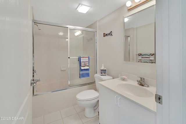 2937 S Atlantic Ave Unit 1108, Daytona Beach Shores, FL 32118 - full bathroom featuring tile patterned floors, vanity, toilet, and enclosed tub / shower combo
