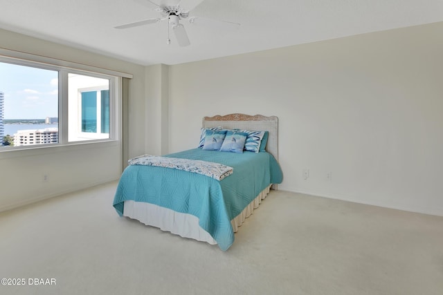 2937 S Atlantic Ave Unit 1108, Daytona Beach Shores, FL 32118 - carpeted bedroom with baseboards and ceiling fan