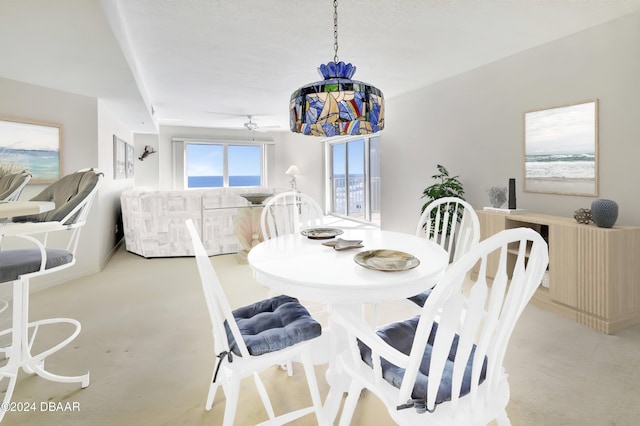 dining area featuring ceiling fan