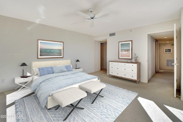 carpeted bedroom featuring ceiling fan