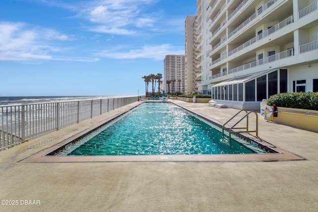 2937 S Atlantic Ave Unit 1108, Daytona Beach Shores, FL 32118 - community pool featuring a patio