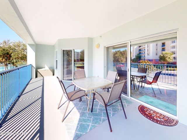 view of patio with a balcony