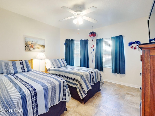 bedroom featuring ceiling fan