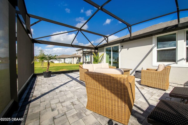 exterior space with a lanai and an outdoor hangout area