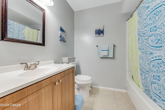 bathroom with tile patterned floors, vanity, and toilet