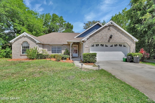 single story home featuring brick siding, an attached garage, a front lawn, and concrete driveway