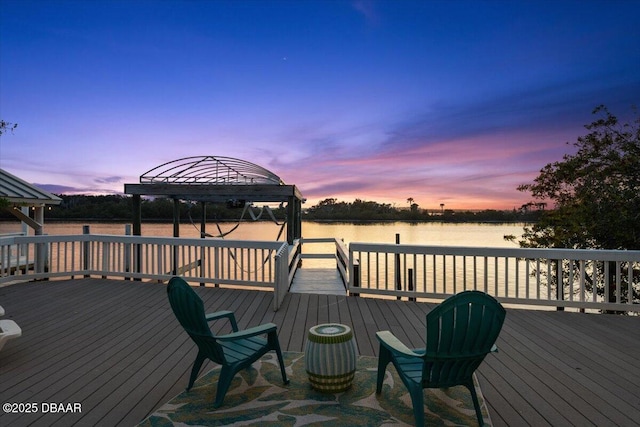 3110 John Anderson Dr, Ormond Beach, FL 32176 - deck at dusk with a water view and a gazebo