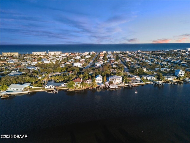 3110 John Anderson Dr, Ormond Beach, FL 32176 - aerial view at dusk featuring a water view