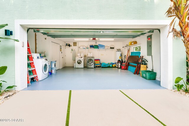 3110 John Anderson Dr, Ormond Beach, FL 32176 - garage with a garage door opener, electric panel, washing machine and dryer, and water heater