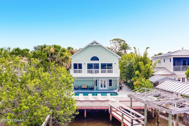 3110 John Anderson Dr, Ormond Beach, FL 32176 - back of property featuring a patio
